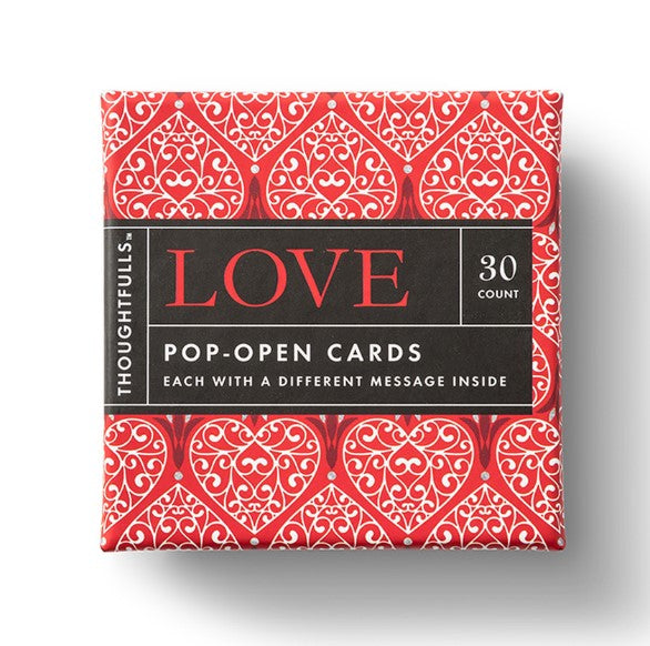 A pack of 'Love Pop Open Cards' with a count of 30, featuring a red and black geometric pattern on the outside and the word 'LOVE' prominently displayed.