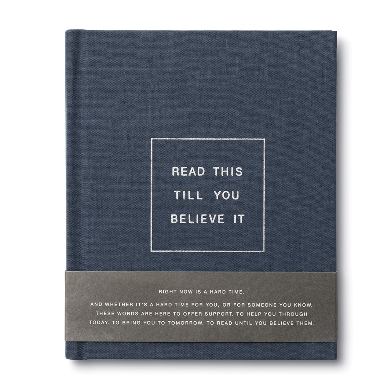 A navy-colored book with the title 'READ THIS TILL YOU BELIEVE IT' printed on the cover.
