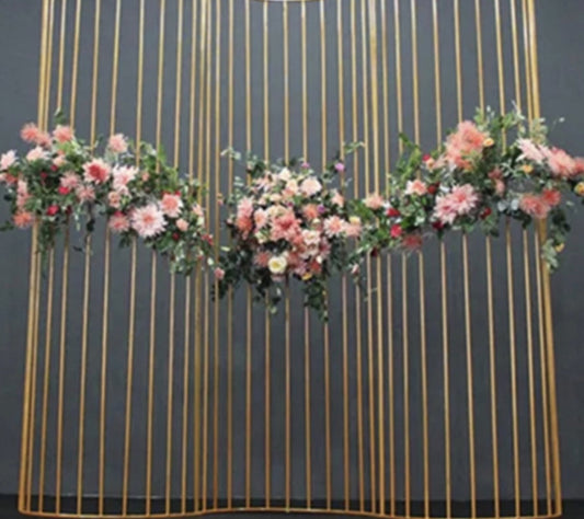 gold wave backdrop with pastel flowers