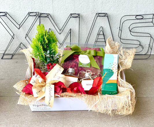 hamper of gourmet foods, living plant and scented candles