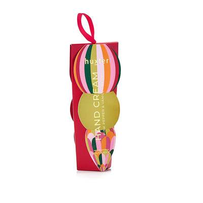 Huxter Christmas hand cream bauble box in mulberry, pink, green and gold stripes