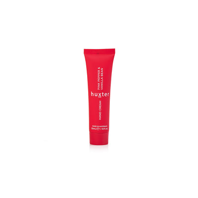 Huxter Pink Pepper and Vanilla Bean 35ml hand cream tube in mulberry red