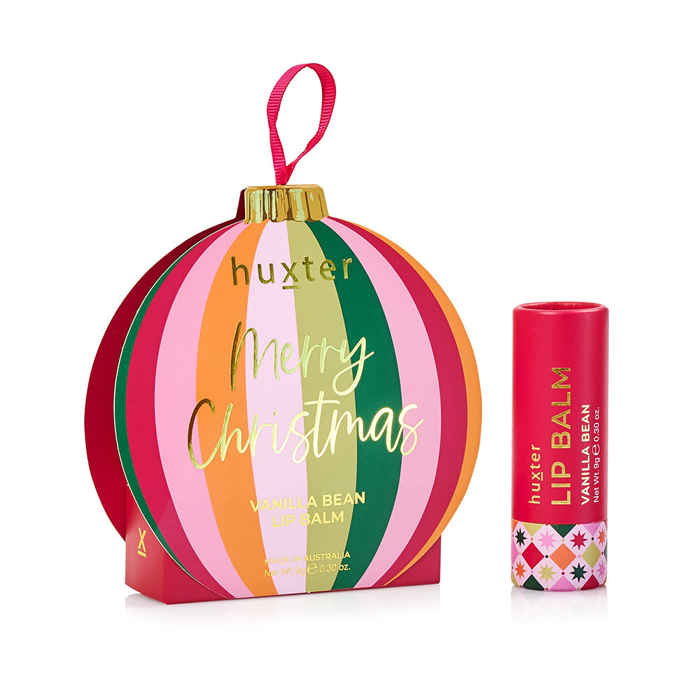 Huxter Vanilla Bean lip balm with its mulberry striped Merry Christmas bauble gift box