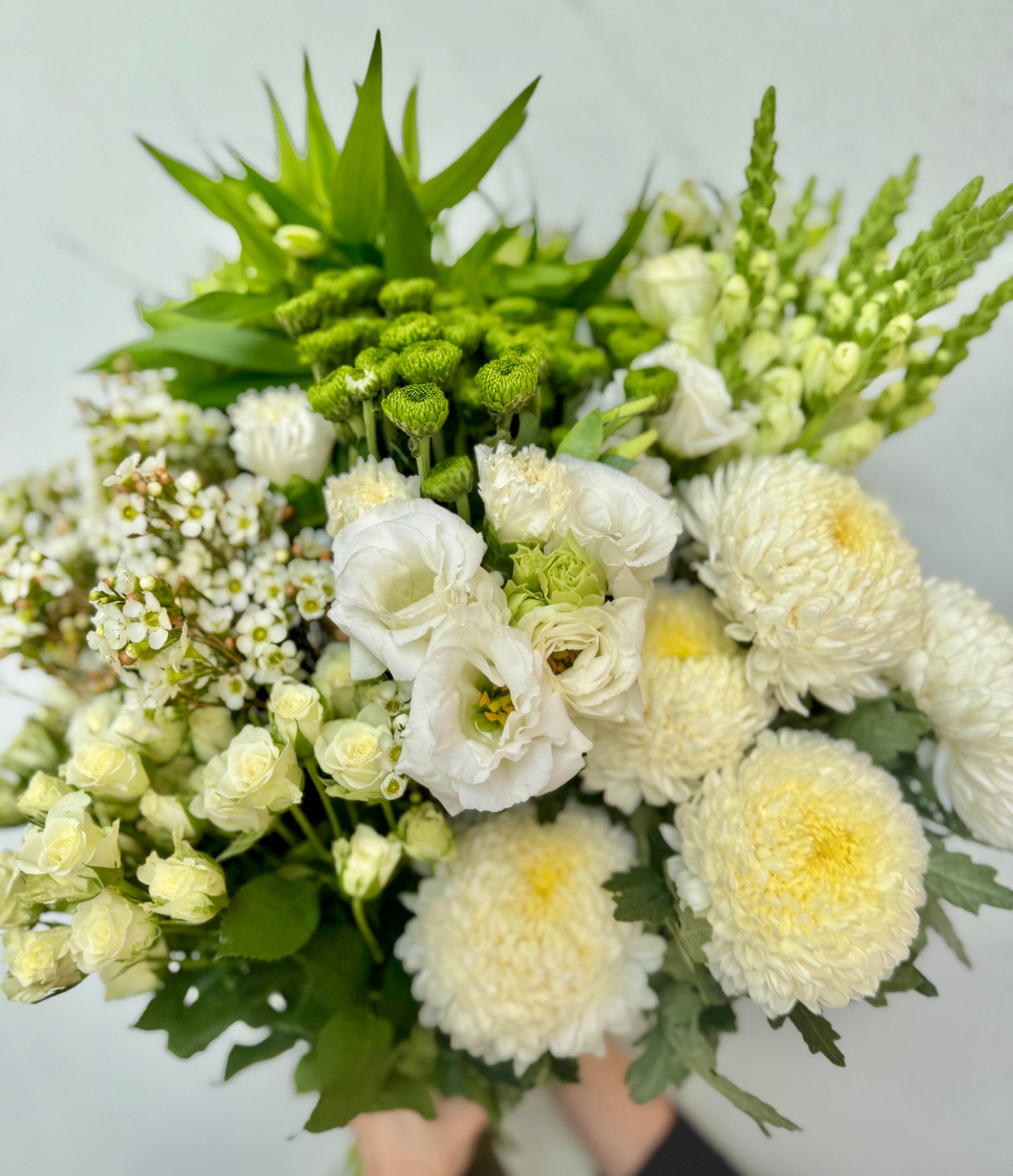 Bouquet of white and green flowers 