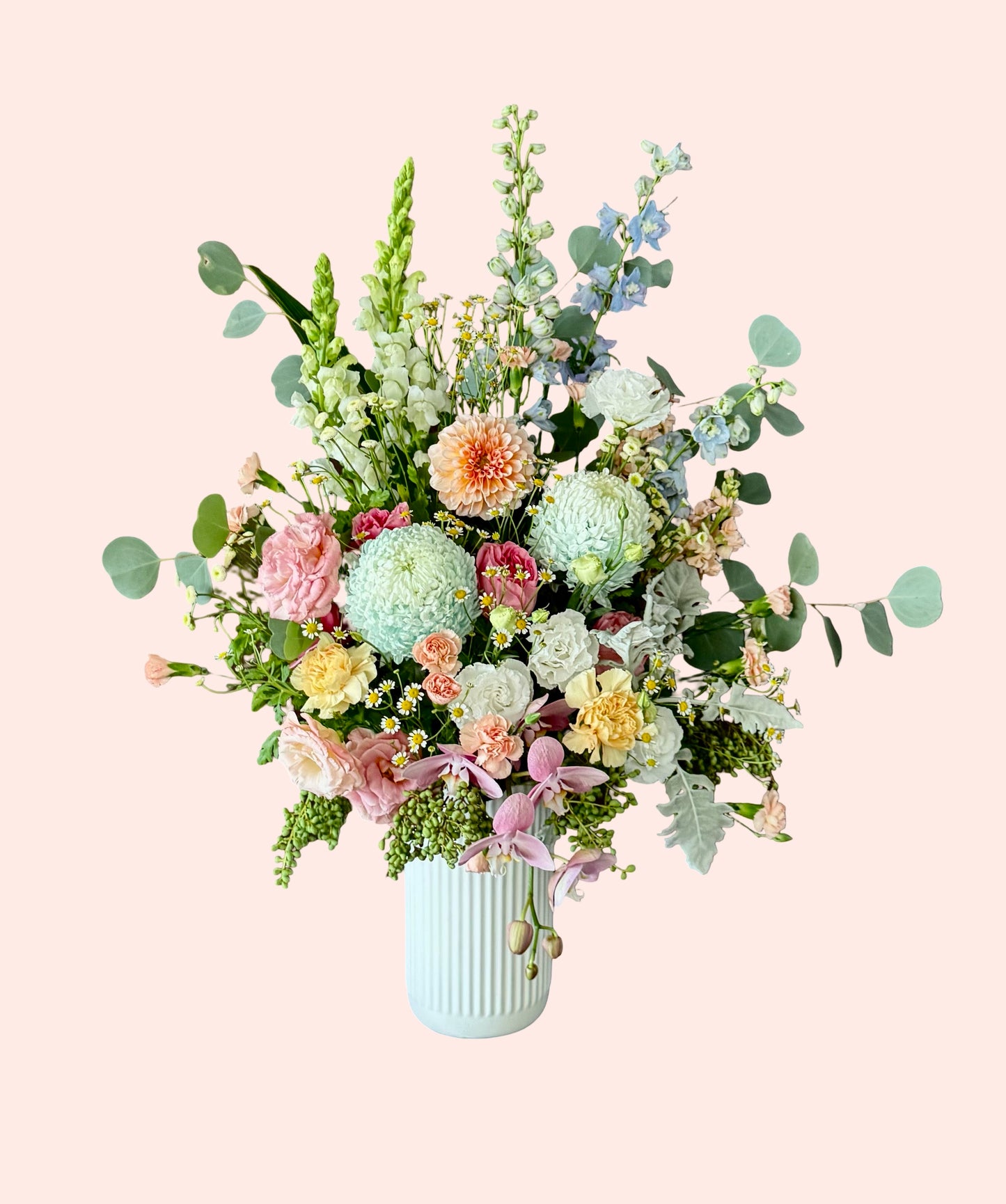 Amalfi Garden luxe flower arrangement with orchids and seasonal blooms in soft pastel tones Brisbane florist