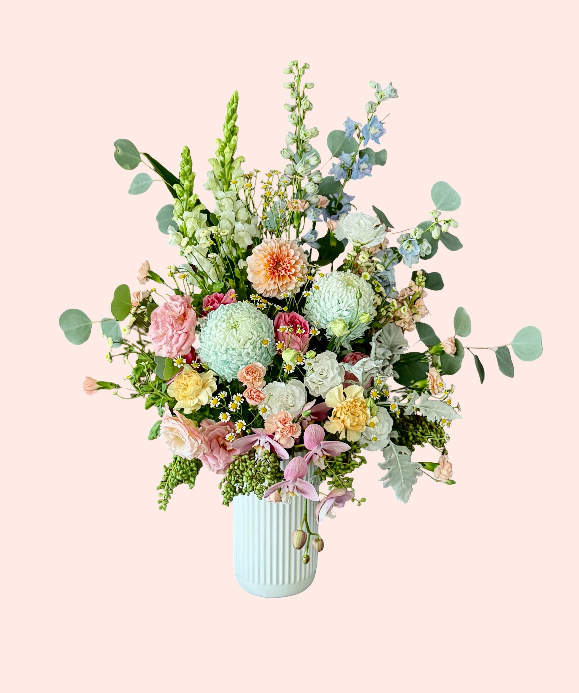 Amalfi Garden luxe flower arrangement with orchids and seasonal blooms in soft pastel tones Brisbane florist