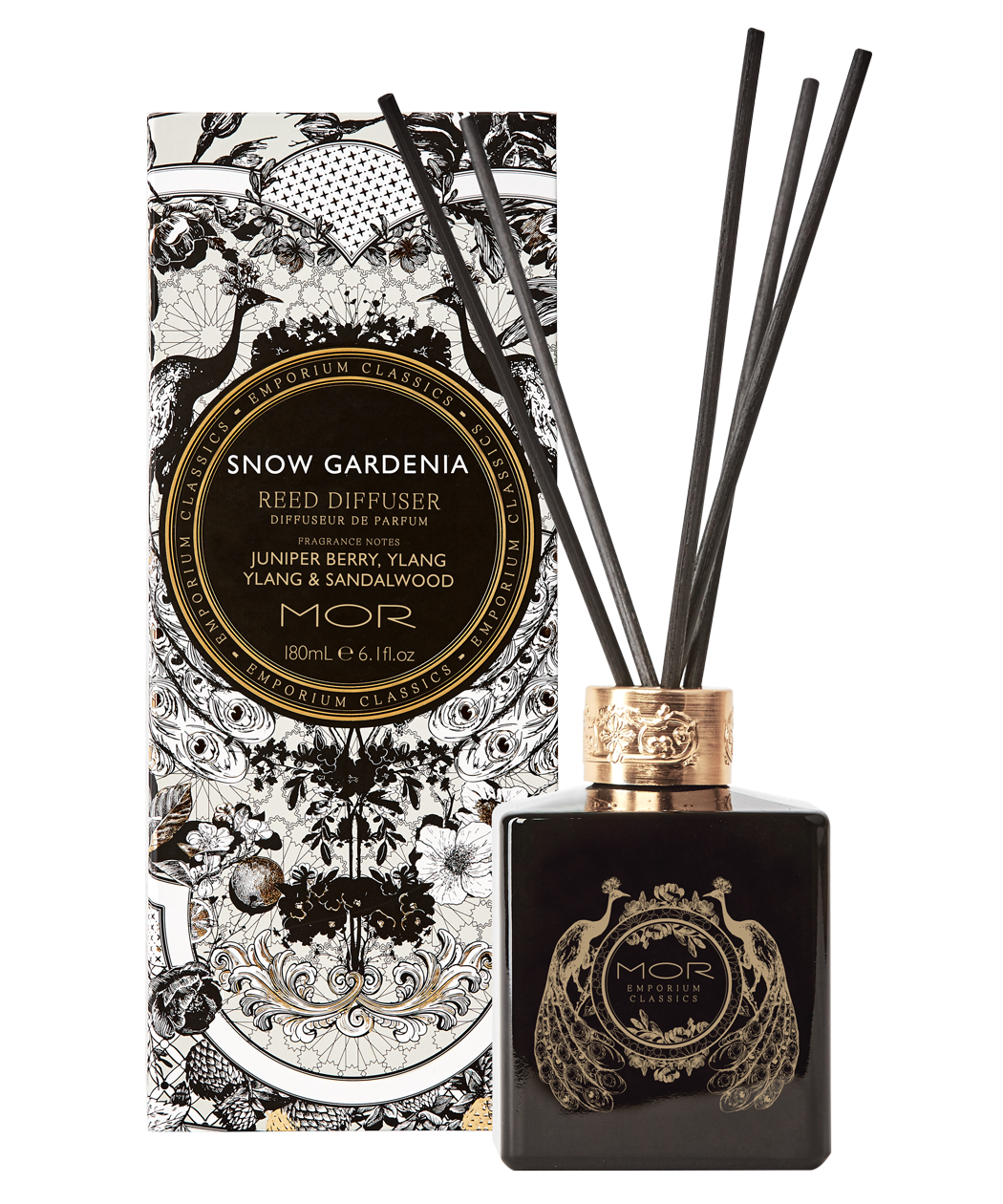 A MOR black glass reed diffuser bottle with gold details, containing a snow gardenia fragrance, displayed alongside its decorative packaging.