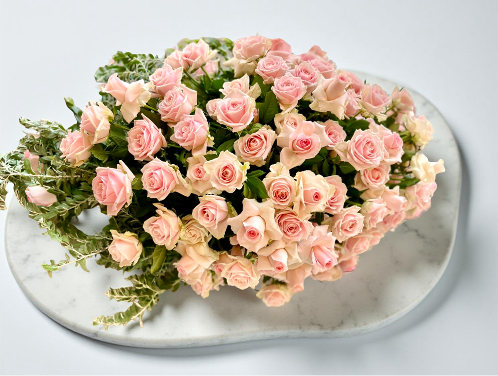 Blush pink roses sympathy tribute