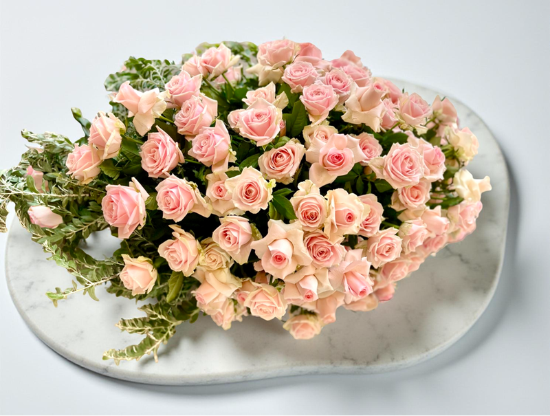 Blush pink roses sympathy tribute