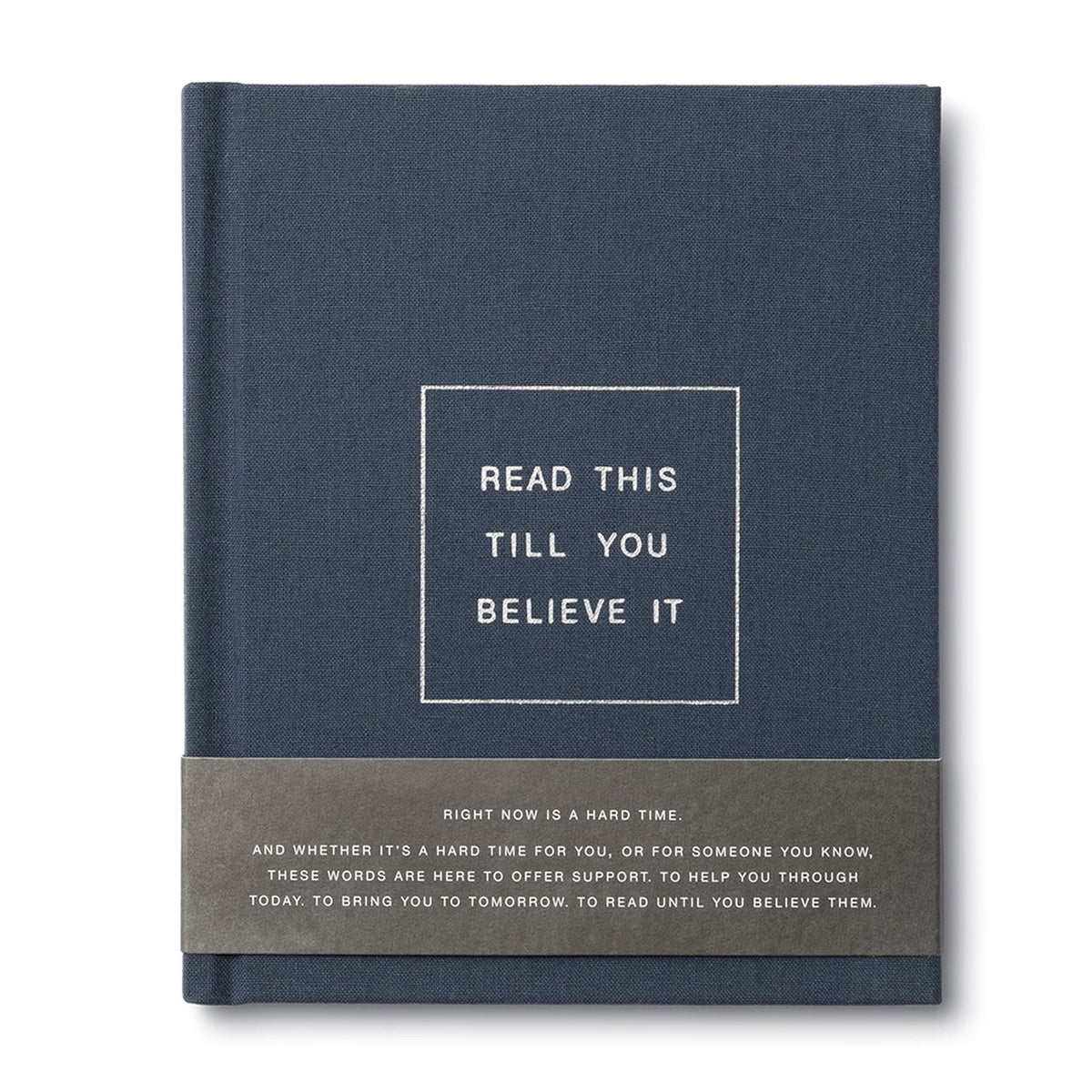 A navy-colored book with the title 'READ THIS TILL YOU BELIEVE IT' printed on the cover.