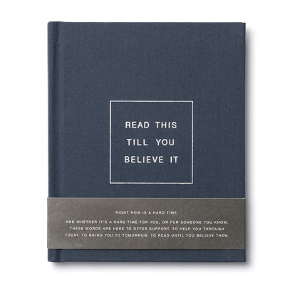 A navy-colored book with the title 'READ THIS TILL YOU BELIEVE IT' printed on the cover.