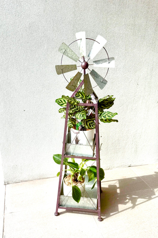 Rustic luxury windmill planter with two lush potted plants in decorative galvanised metal stand by Perfect Petals Brisbane