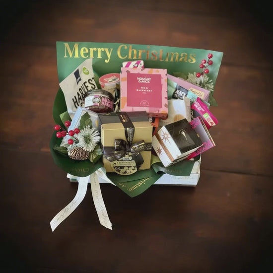 “Luxury Christmas gourmet hamper with sweet treats, chocolates, nougat, festive berries and ribbon – Perfect Petals Brisbane”